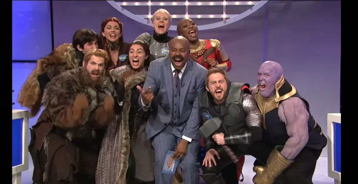 the cast of saturday night live dress up as characters from avengers and game of thrones in a celebrity family feud spoof.