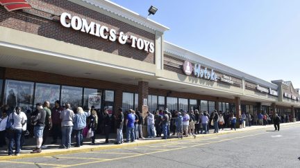 Multitudes of fans gather to celebrate Free Comic Book Day at signing event with DC Entertainment writers Scott Snyder, James Tynin IV and Marguerite Bennett at Fourth World Comics on May 2, 2015 in Smithtown, New York.