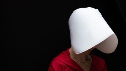 A woman dressed as a character from the novel-turned-TV series 