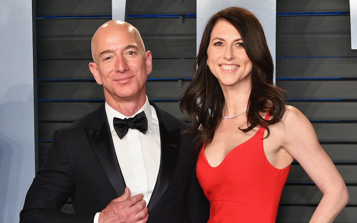 MacKenzie and Jeff Bezos pose on the Vanity Fair Oscar Party red carpet.