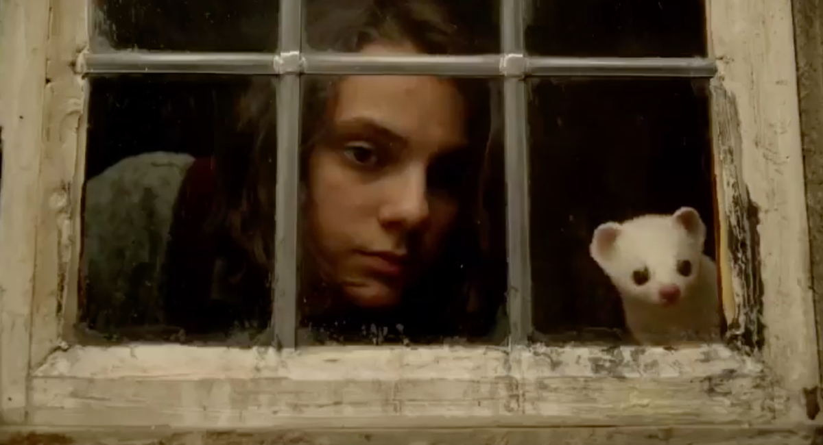 Lyra (Dafne Keen) and Pantalaimon try to stay one step ahead of the villains in His Dark Materials.