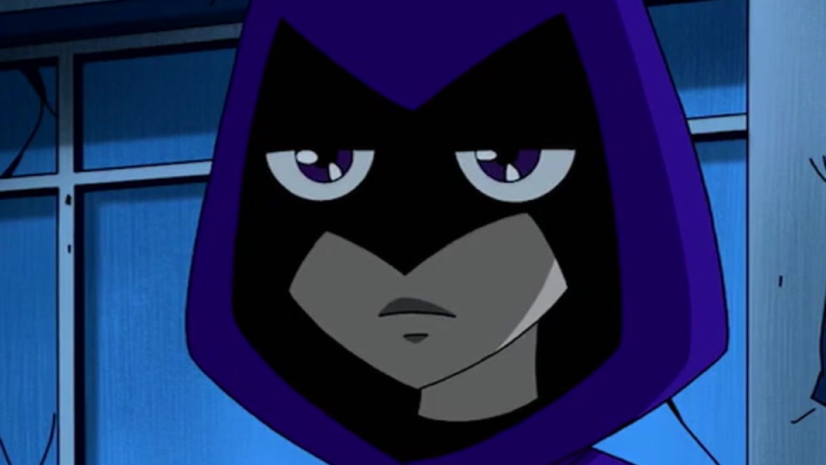 Closeup of Raven's face looking stoic in Teen Titans.