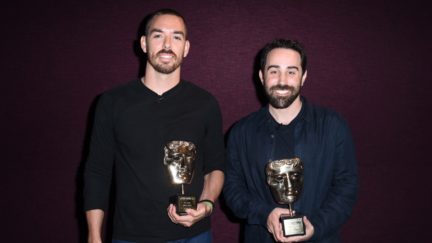 Co-founders and co-CEOs of Riot Games Marc Merrill and Brandon Beck pose with their awards at BAFTA Honours Riot Games with Special Award at The London West Hollywood on June 12, 2017 in West Hollywood, California. (Photo by Vivien Killilea/Getty Images for BAFTA Los Angeles)