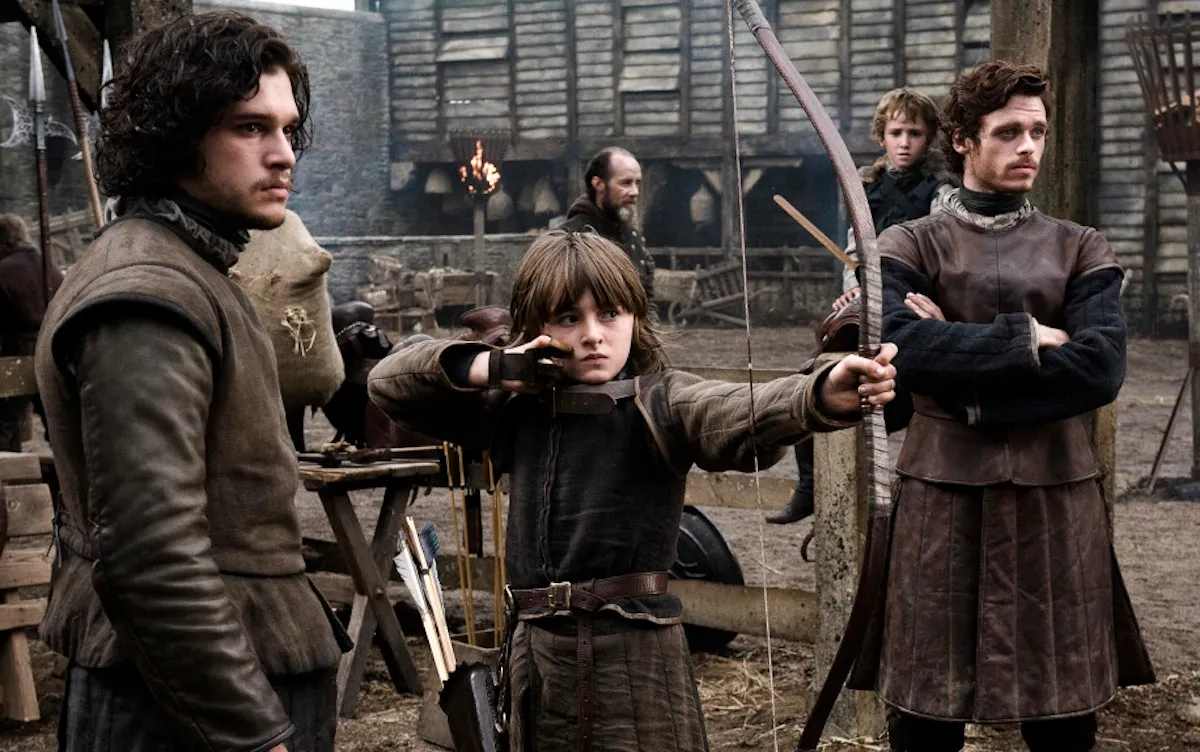 Bran and Robb Stark with Jon Snow in Game of Thrones