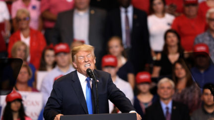 Donald Trump looks mad at a rally.