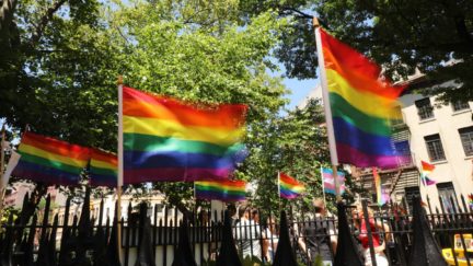 Rainbow pride flags fly outside the Stonewall Inn as crowds begin to gather to celebrate Pride Month on June 26, 2019 in New York City. Thousands of members of the LGBTQ community have been gathering outside of the historic gay bar in Greenwich Village to celebrate the 50th anniversary of riots at the inn, which many people consider the birth of the modern gay rights movement in America. (Photo by Spencer Platt/Getty Images)