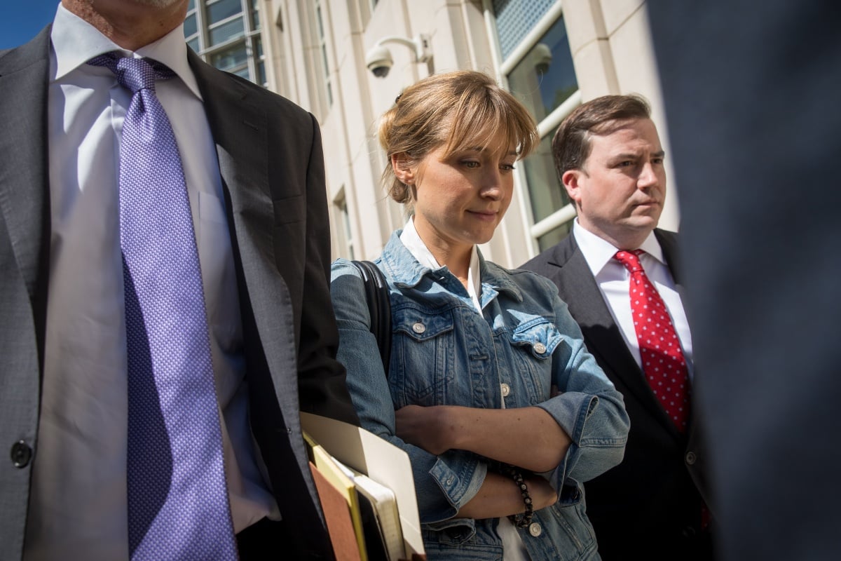 Actress Allison Mack exits the U.S. District Court for the Eastern District of New York following a status conference, June 12, 2018 in the Brooklyn borough of New York City. Mack was charged in April with sex trafficking for her involvement with a self-help organization for women that forced members into sexual acts with their leader. The group, called Nxivm, was led by founder Keith Raniere, who was arrested in March on sex-trafficking charges. (Photo by Drew Angerer/Getty Images)