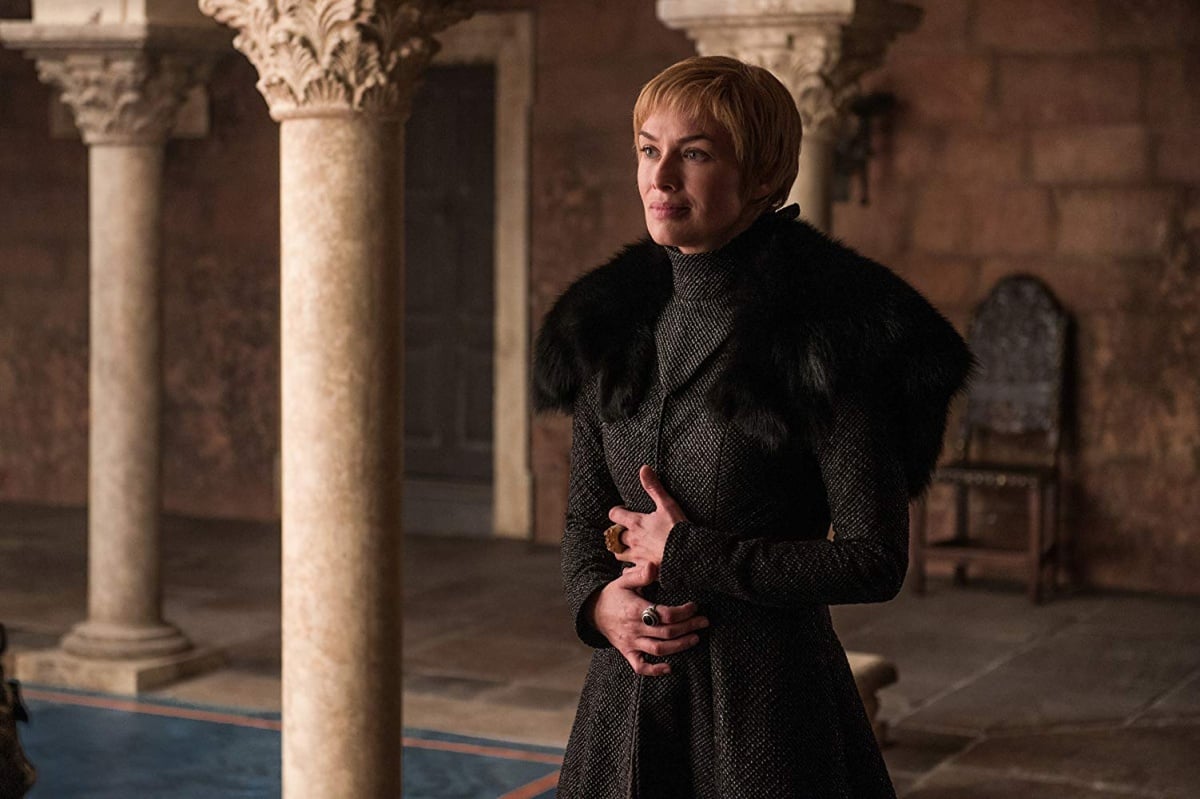 Actress Lena Headey in Game of Thrones as Cersei Lannister holding her baby