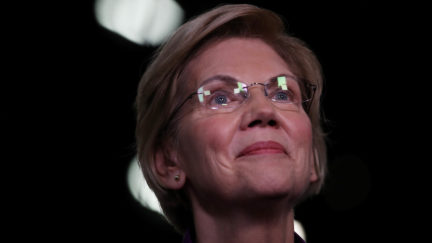 Elizabeth Warren (D-MA) speaks to the media in the spin room after the first night of the Democratic presidential debate