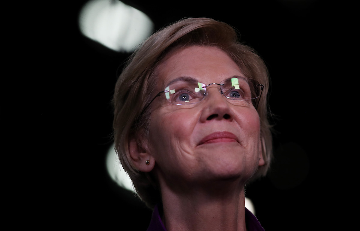 Elizabeth Warren (D-MA) speaks to the media in the spin room after the first night of the Democratic presidential debate
