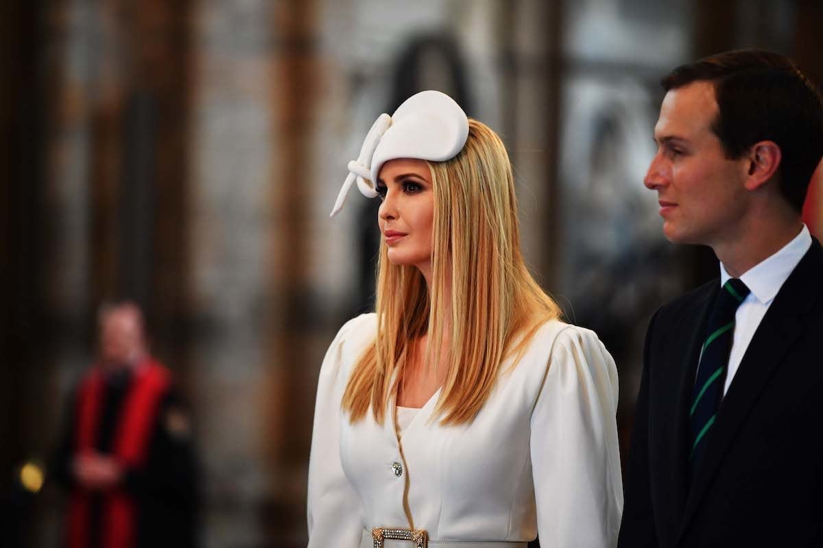 Ivanka Trump wears a stupid hat next to Jared Kushner at Westminster Abbey.
