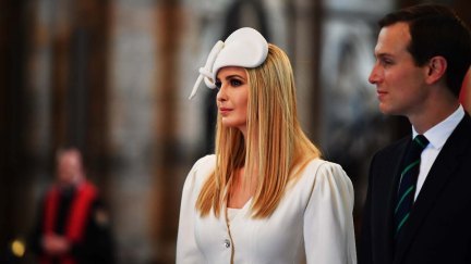 Ivanka Trump wears a stupid hat next to Jared Kushner at Westminster Abbey.