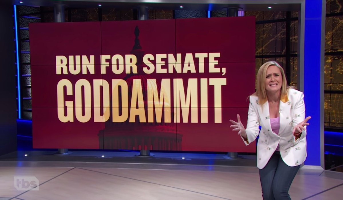 Samantha Bee pleads in front of a sign reading 'Run for Senate, Goddamnit'