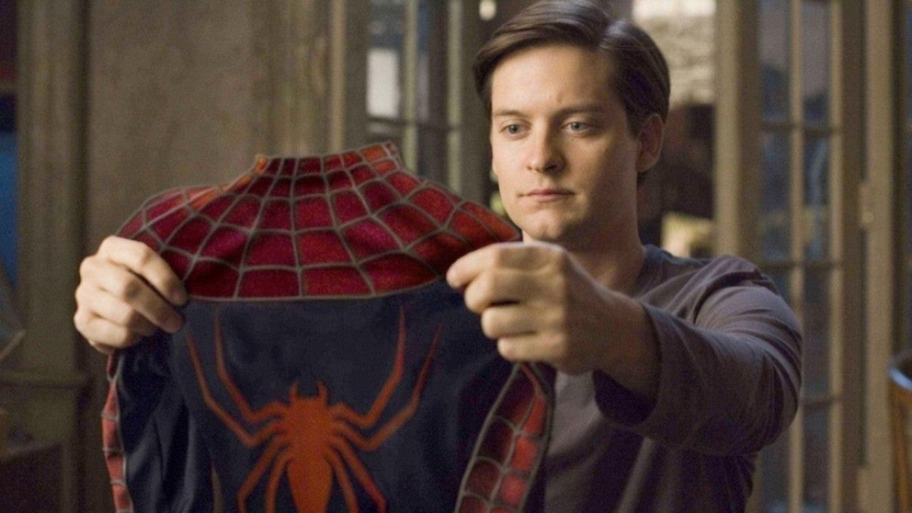 tobeyt maguire as peter parker in spider-man 2.