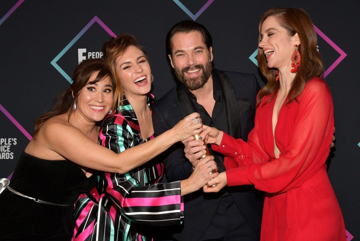 (L-R) Emily Andras, Katherine Barrell, Tim Rozon, and Melanie Scrofano of Wynonna Earp, Sci-fi/Fantasy Show of 2018, pose in the press room during the People's Choice Awards 2018 at Barker Hangar on November 11, 2018 in Santa Monica, California. (Photo by Matt Winkelmeyer/Getty Images)