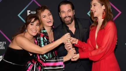 (L-R) Emily Andras, Katherine Barrell, Tim Rozon, and Melanie Scrofano of Wynonna Earp, Sci-fi/Fantasy Show of 2018, pose in the press room during the People's Choice Awards 2018 at Barker Hangar on November 11, 2018 in Santa Monica, California. (Photo by Matt Winkelmeyer/Getty Images)