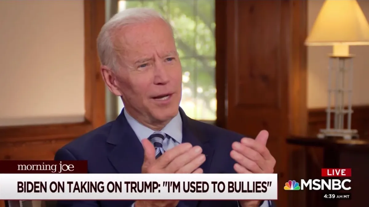 Joe Biden on MSNBC above a chyron reading "Biden on taking on Trump: 'I'm used to bullies.'"