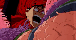 Kaneda being overtaken by Tetsuo's gross growing flesh at the end of Akira.