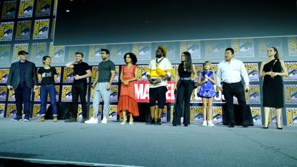 the cast of the eternals and kevin feige at comic con