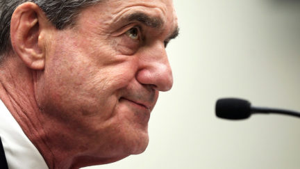 Robert Mueller looks pissed off about having to speak into this microphone.