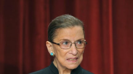 US Supreme Court Justice Ruth Bader Ginsburg poses during a group photo.