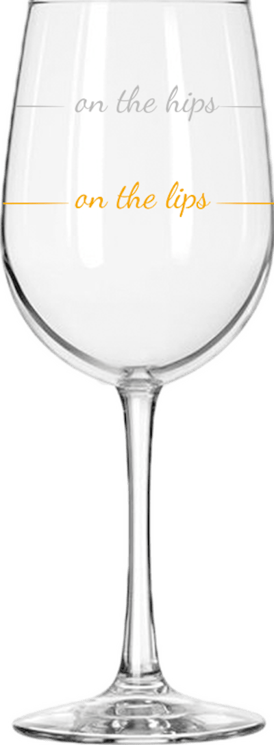 Wine glass with markings reading "on the lips" for a small portion and "on the hips" for a larger pour.