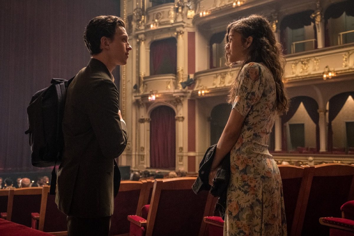 Peter Parker (Tom Holland) talks to MJ (Zendya) in a theater Spider-Man: Far From Home.