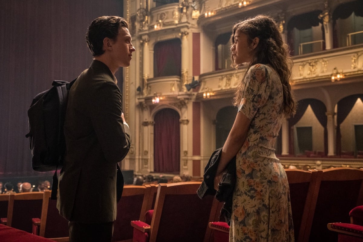 Peter Parker (Tom Holland) talks to MJ (Zendya) in a theater Spider-Man: Far From Home.