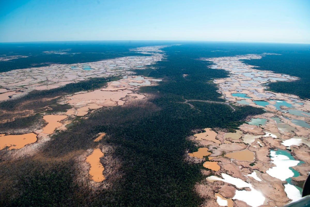 An aerial view over a chemically deforested area of the Amazon jungle caused by illegal mining activities in the river basin of the Madre de Dios region in southeast Peru, on May 17, 2019, during the 'Mercury' joint operation by Peruvian military and police ongoing since February 2019. - Illegal mining activities for gold have caused irreversible ecological damage to more than 11,000 hectares of Amazonian forest and river basins, generating illicit activities in parallel such as human trafficking, mercury trafficking, hired killers and prostitution. (Photo by Cris BOURONCLE / AFP) (Photo credit should read CRIS BOURONCLE/AFP/Getty Images)