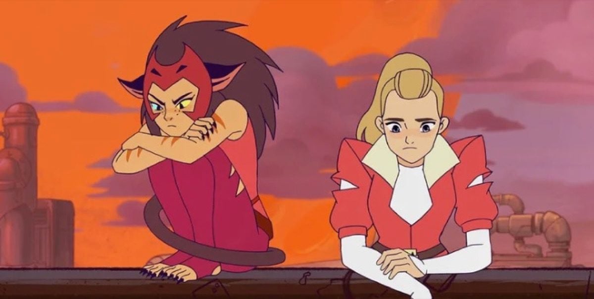 Adora and Catra talking, looking sad in Netflix's She-Ra and the Princesses of Power.