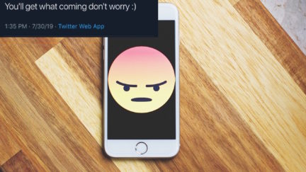 A threatening tweet and an angry emoji on a phone.