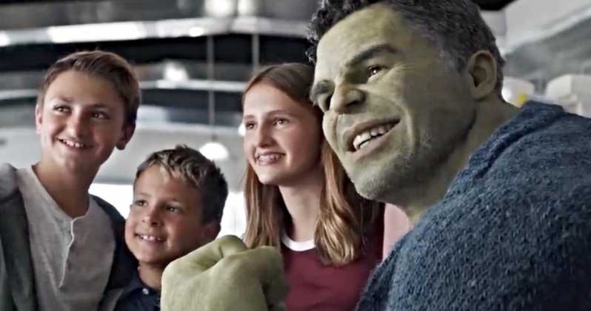 Professor Hulk poses for a picture with kids in Marvel's Avengers: Endgame.