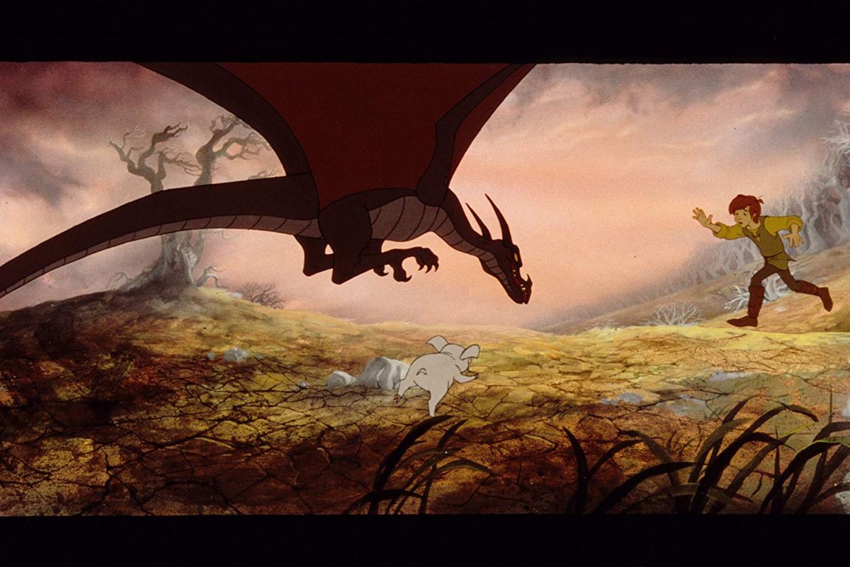 animated still of The Black Cauldron where taran protect hen wen from a dragon