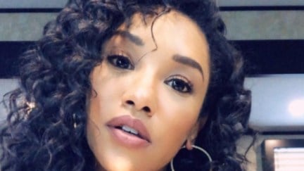 A selfie of Candice Patton wearing natural curls.