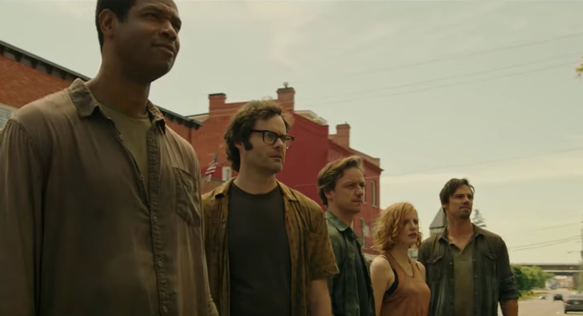 Mike (Isaiah Mustafa), Richie (Bill Hader), Bill (James McAvoy), Bev (Jessica Chastain), and Ben (Jay Ryan) face their pasts in IT Chapter Two.