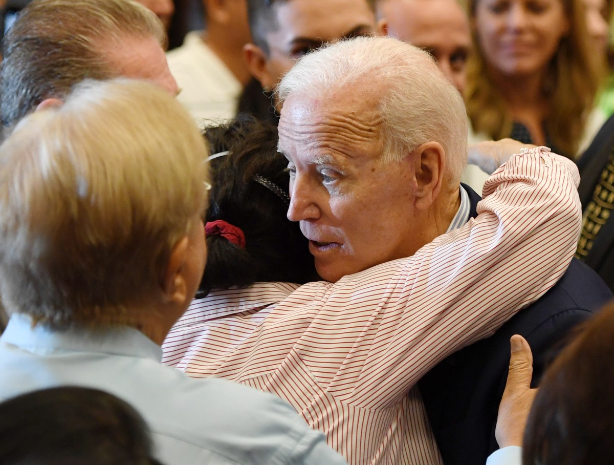 Joe Biden hugs a supporter.