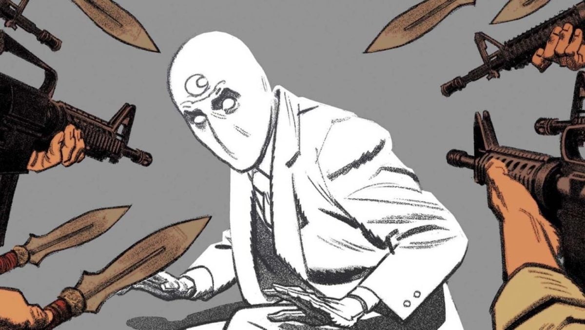 moon knight in the comics surrounded by weapons 