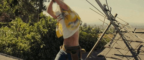 Brad Pitt takes his shirt off in Quentin Tarantino's Once Upon a Time in Hollywood.