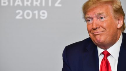 Donald Trump gives a weird goofy face.