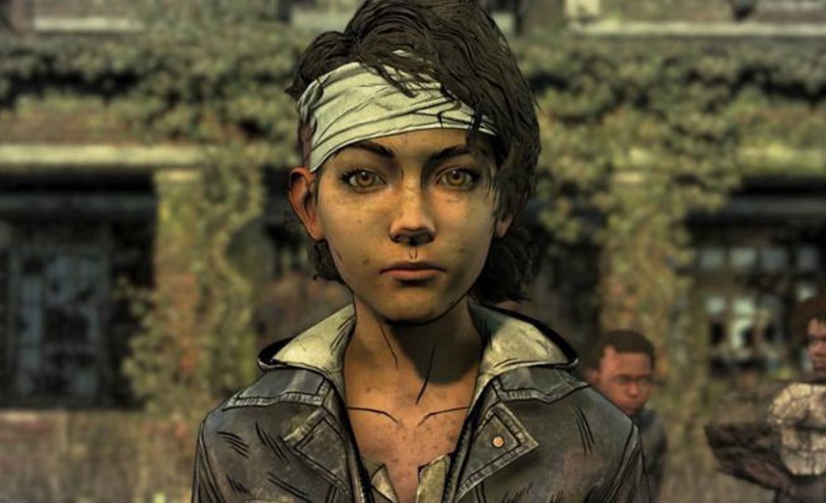 Clementine from the Walking Dead game looks at the camera with her head bandaged.