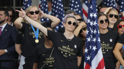 The US Women's soccer team celebrates during their victory tour.