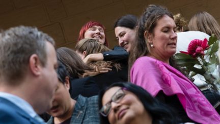 SYDNEY, AUSTRALIA - SEPTEMBER 26: Supporters of the bill to decriminalise abortion embrace outside NSW Parliament on September 26, 2019 in Sydney, Australia. After two weeks of debate, the Upper House of the NSW parliament passed legislation to decriminalise abortion on Wednesday night. The Reproductive Health Care Reform Bill 2019 - which was introduced by Independent Alex Greenwich and co-sponsored by 15 MPs from across all sides of politics - now returned to the NSW Legislative Assembly this morning to be passed into law. Rhe bill removes abortion from the Crimes Act and will regulate it as a medical procedure, with extra safeguards for abortions after 22 weeks' gestation. Abortions had been on the criminal code in NSW since 1900 with a penalty of 10 years in prison. (Photo by Brook Mitchell/Getty Images)
