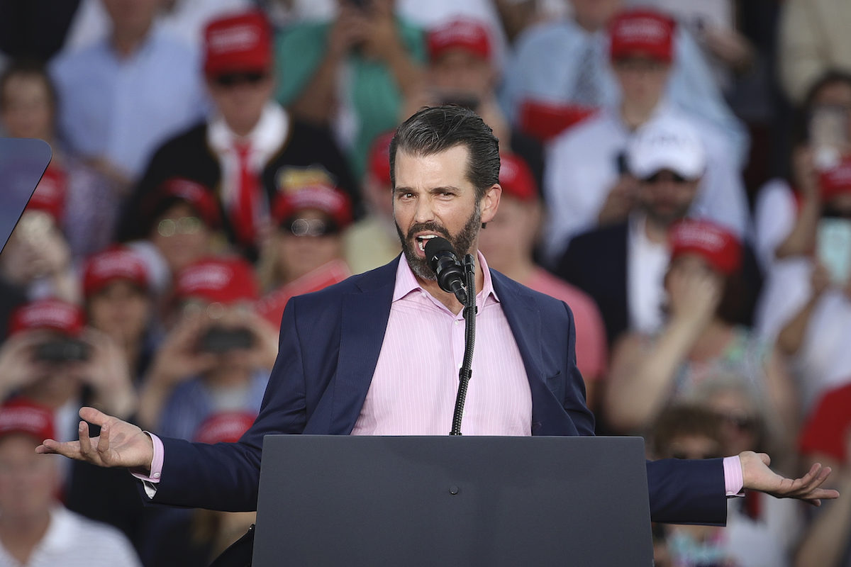 Donald Trump Jr acts like a gross idiot at his father's rally.