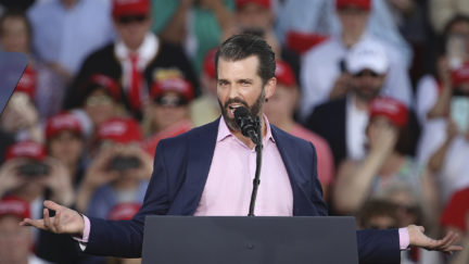 Donald Trump Jr acts like a gross idiot at his father's rally.