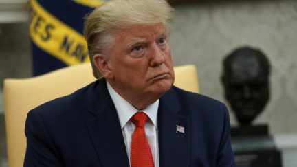 Donald Trump speaks from a chair in the Oval Office