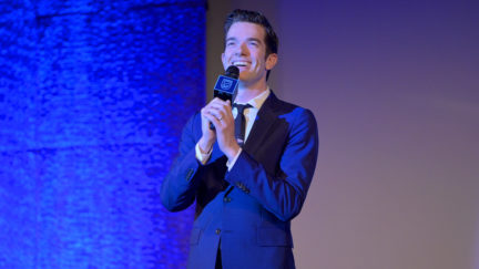 John Mulaney performs onstage
