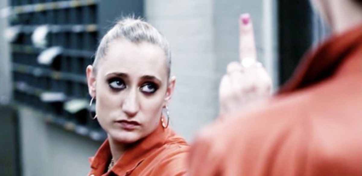 Lauren Socha as Kelly in E4's Misfits, giving someone the finger.