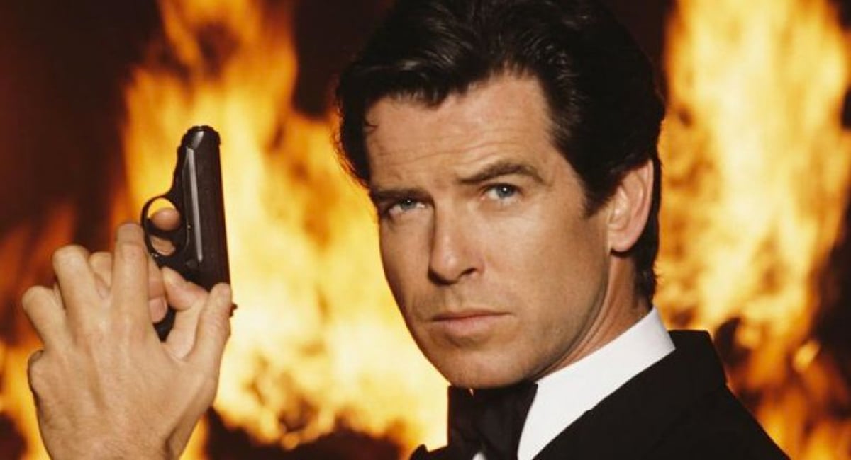 Pierce Brosnan poses in a publicity still for his run as James Bond.