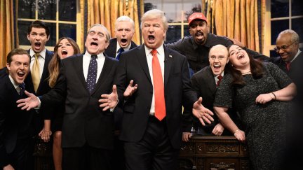 The cast of SNL dressed up as the members of the Trump administration, singing.