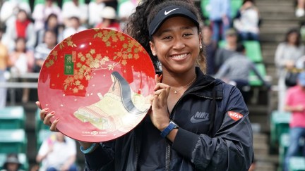 Toray Pan Pacific Open - Day 7 OSAKA, JAPAN - SEPTEMBER 22: Singles champion Naomi Osaka of Japan poses for photographs with the trophy after the Singles final agains Anastasia Pavlyuchenkova of Russia during day seven of the Toray Pan Pacific Open at Utsubo Tennis Cent on September 22, 2019 in Osaka, Japan. (Photo by Koji Watanabe/Getty Images)